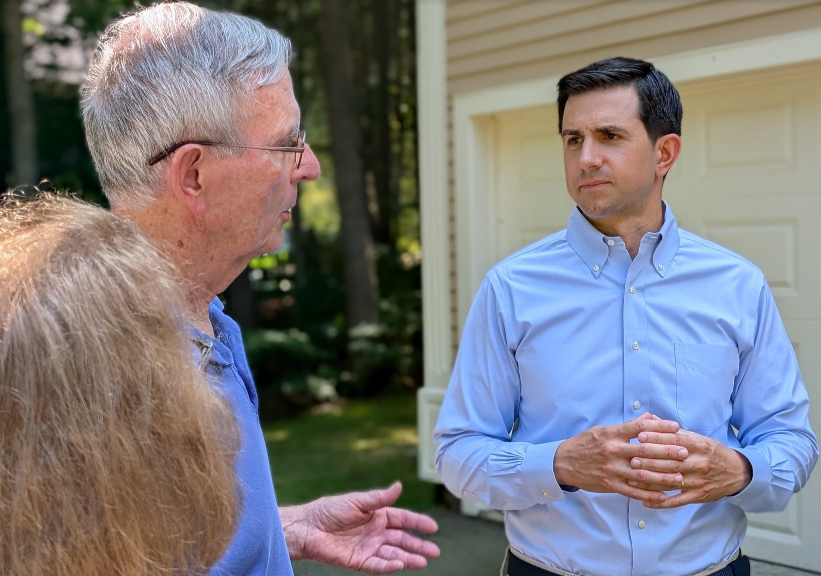 Isaac Fernandez speaking with Londonderry residents
